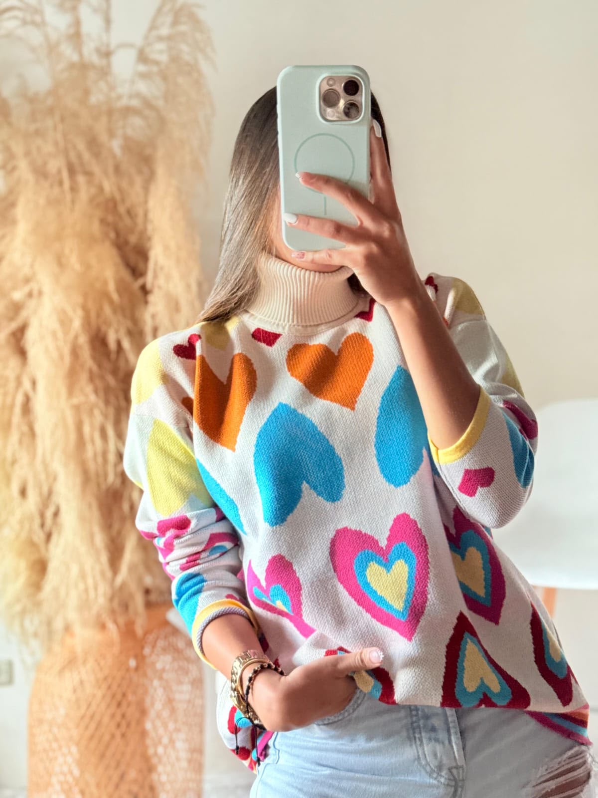 Buzo corazones multicolor