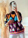 Buzo corazones multicolor